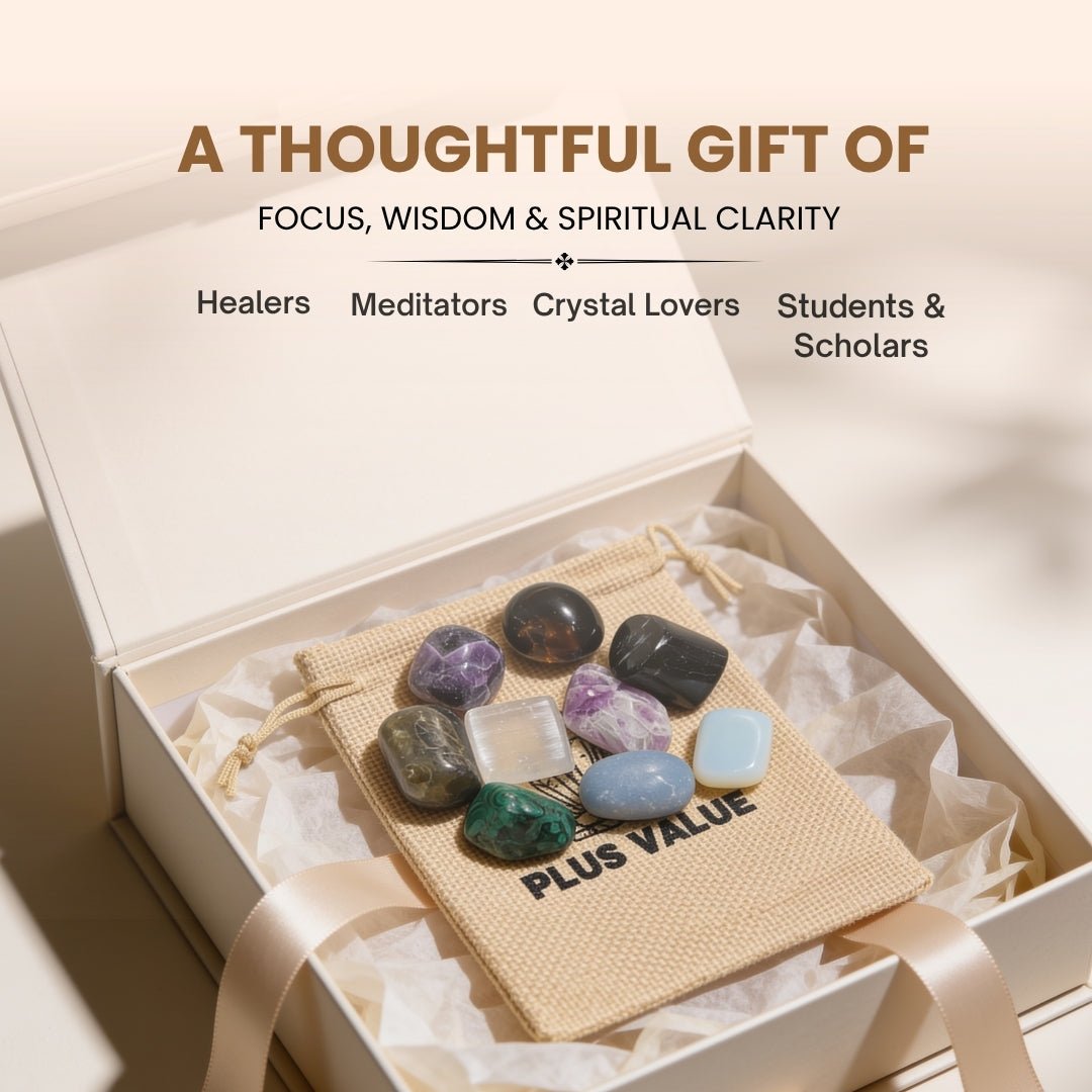 Assortment of smooth tumbled Purple Fluorite stones resting in open hand demonstrating pebble scale, glassy polish, and tactile weight