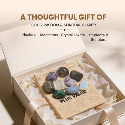 Assortment of smooth tumbled Purple Fluorite stones resting in open hand demonstrating pebble scale, glassy polish, and tactile weight