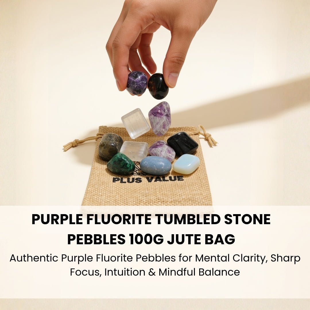 Purple Fluorite brain stones placed on a wooden study table next to open notebooks and a computer to relieve mental strain and boost focus