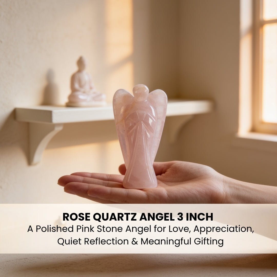 3-inch Rose Quartz guardian angel resting comfortably in palm showing pocket-statue size and smooth finish
