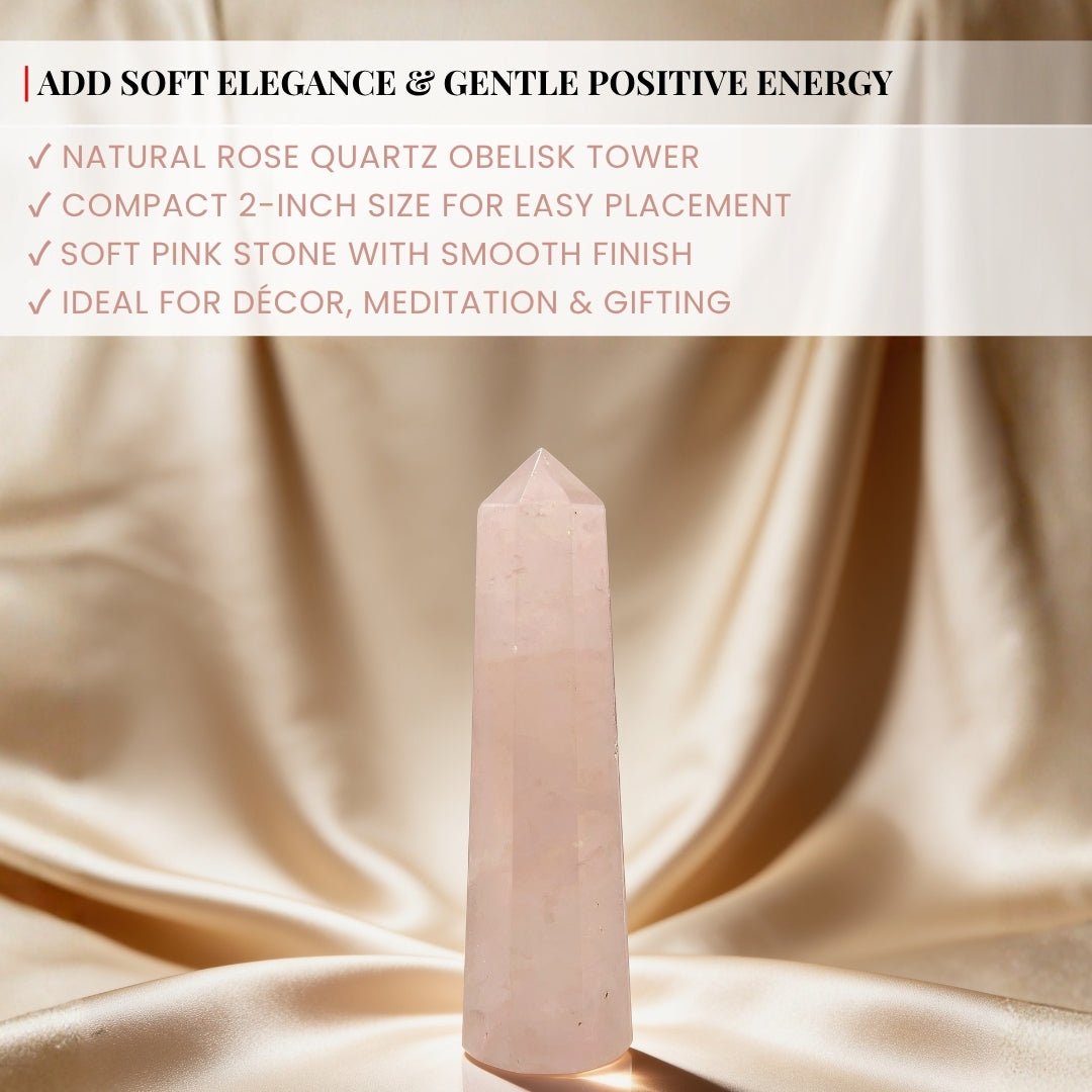 rose quartz wand held in hand for scale