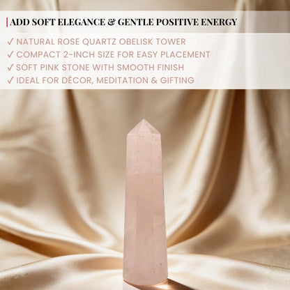 rose quartz wand held in hand for scale