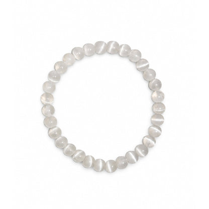 Scale graphic showing 6 mm bead diameter alongside resilient multi-strand clear elastic stretch cord construction