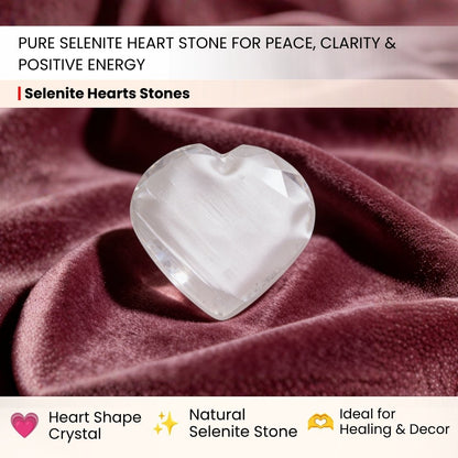 close-up of the carved heart shape and smooth selenite surface