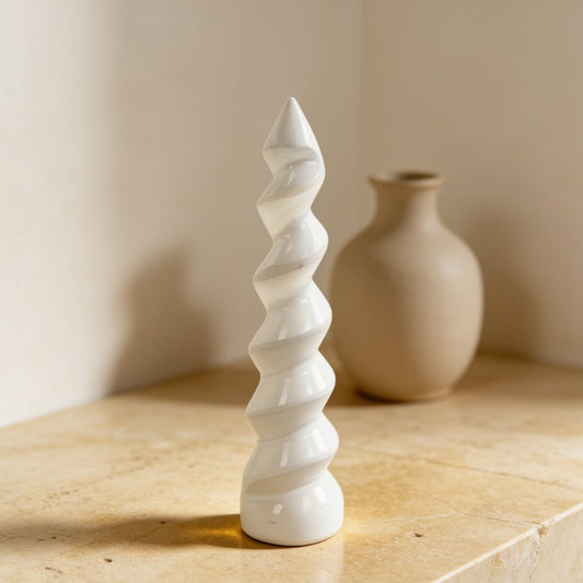 selenite unicorn horn spiral wand 6 inch on a plain background
