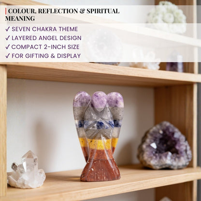 Scale measurement graphic indicating 2-inch height, wingspan width, and base depth of Seven Chakra carved angel