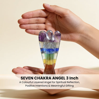 Substantial 3-inch Seven Chakra guardian angel resting in palm demonstrating handheld altar size and smooth polish