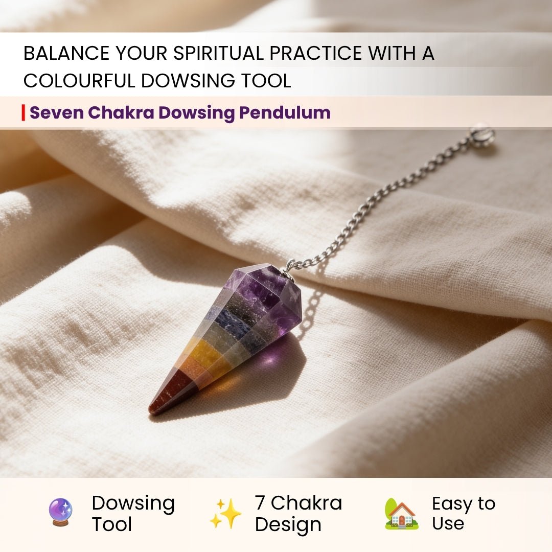 seven chakra pendulum suspended above a dowsing chart