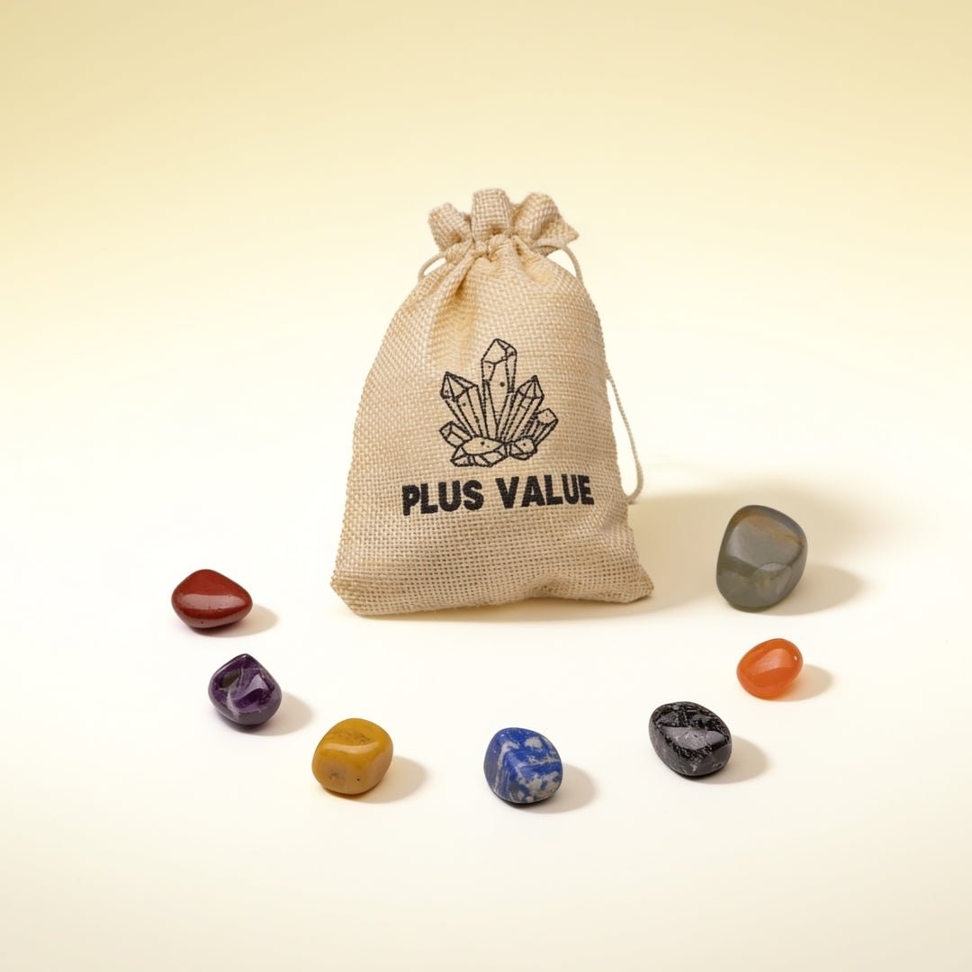 set of seven natural chakra stones with a jute bag