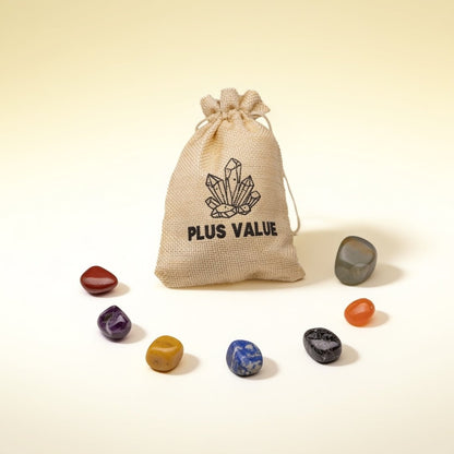 set of seven natural chakra stones with a jute bag