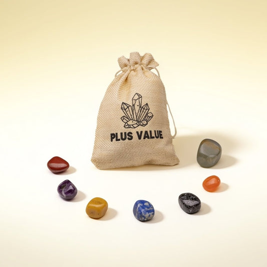 set of seven natural chakra stones with a jute bag