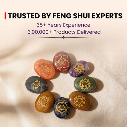 seven chakra stones placed at traditional chakra positions on the body