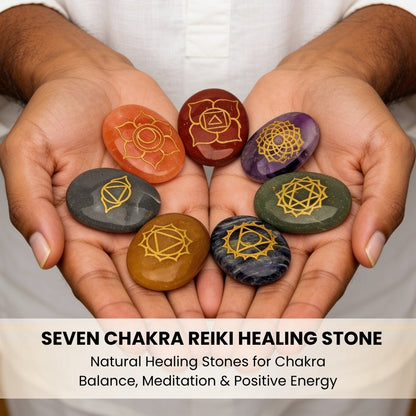 one heart-shaped chakra stone held in hand for size reference