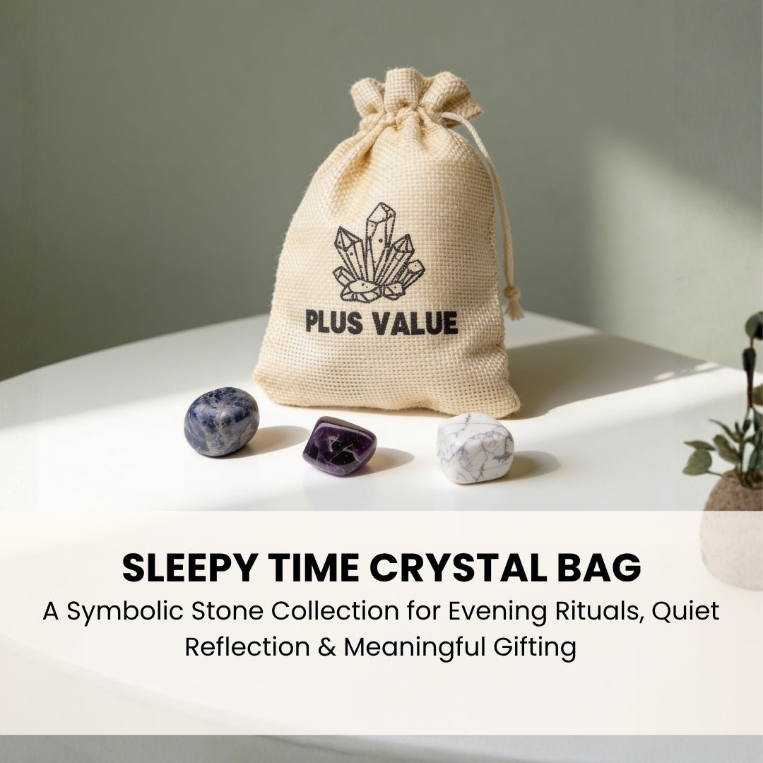 Set of soothing bedtime crystals resting in open palm demonstrating smooth worry-stone texture and handheld size
