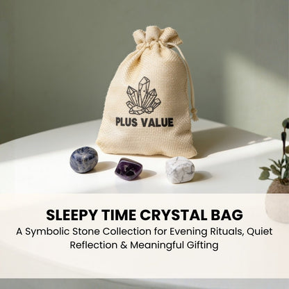 Set of soothing bedtime crystals resting in open palm demonstrating smooth worry-stone texture and handheld size