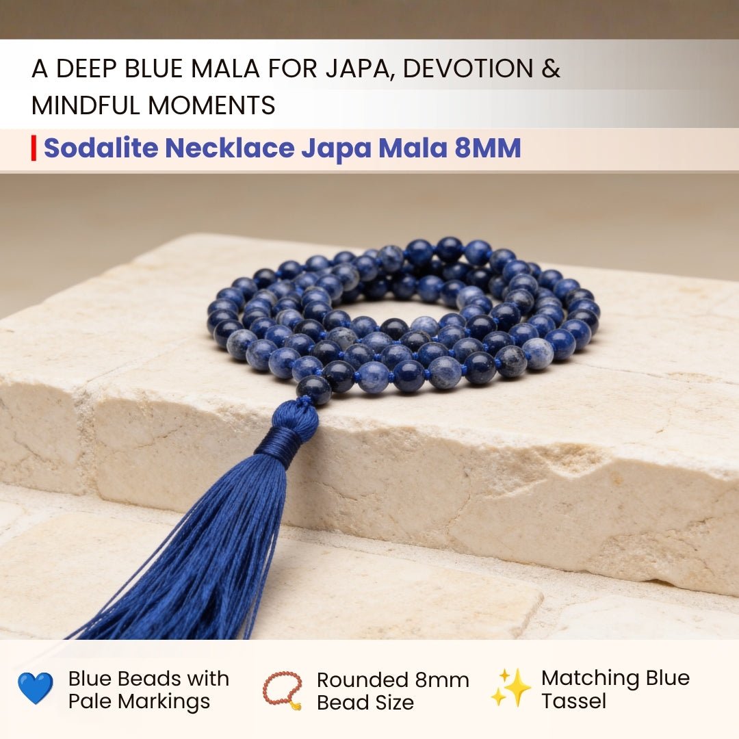 Close-up of 8 mm polished Sodalite beads showing rich royal blue hues mottled with natural white calcite veins