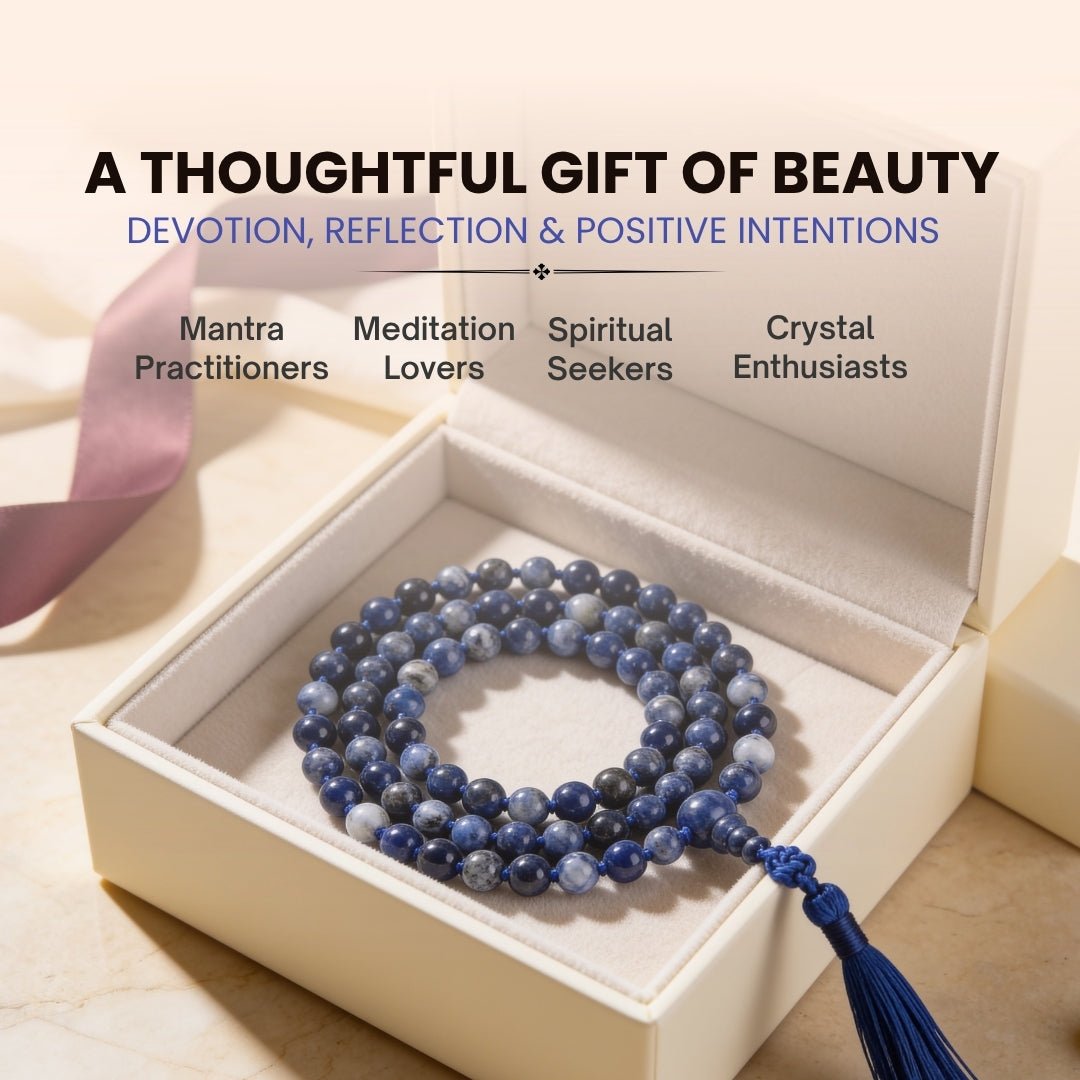 8 mm Sodalite mala held in fingers during Throat Chakra chanting, intuitive focus, and mantra recitation