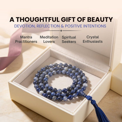 8 mm Sodalite mala held in fingers during Throat Chakra chanting, intuitive focus, and mantra recitation