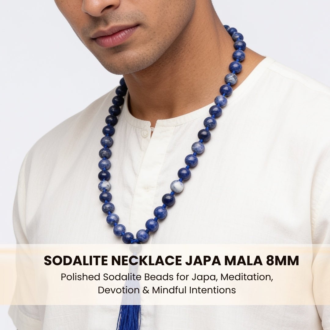 Hand-polished Sodalite guru bead finished with matching deep navy blue silky hanging tassel