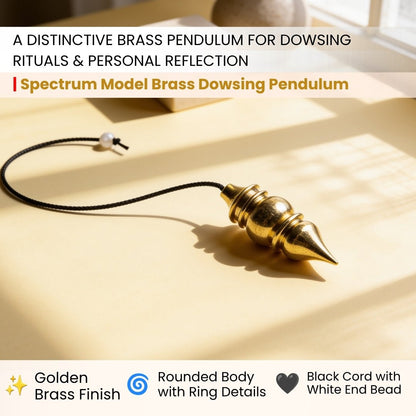 Close-up of Spectrum model brass pendulum showing precision-machined stepped ridges and pointed conical tip