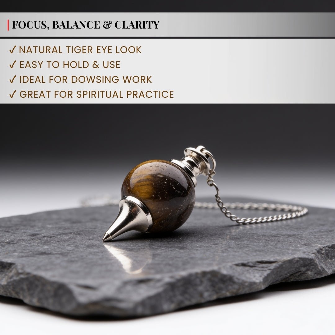 tiger eye ball pendulum held by its chain for scale