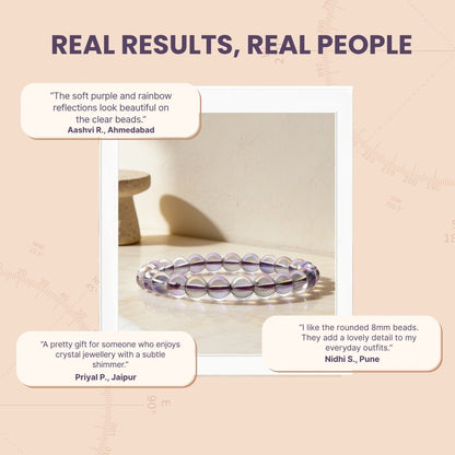Rainbow Titanium Aura Quartz bracelet displayed on jewelry cushion beside protective drawstring pouch and gift box