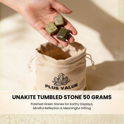 50 grams of polished Unakite pebbles held in open palm demonstrating smooth finish and earthy colors