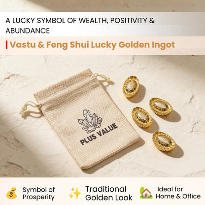 close-up of a curved golden feng shui ingot with raised ends