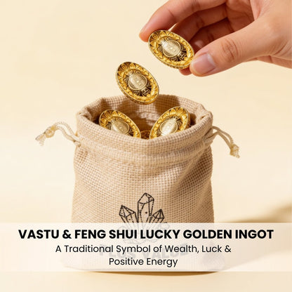 four golden feng shui ingots in a jute bag on an office desk