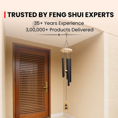 Feng Shui wind chime infographic highlighting suppression of negative energy, five elements harmonization, and metal remedy placement