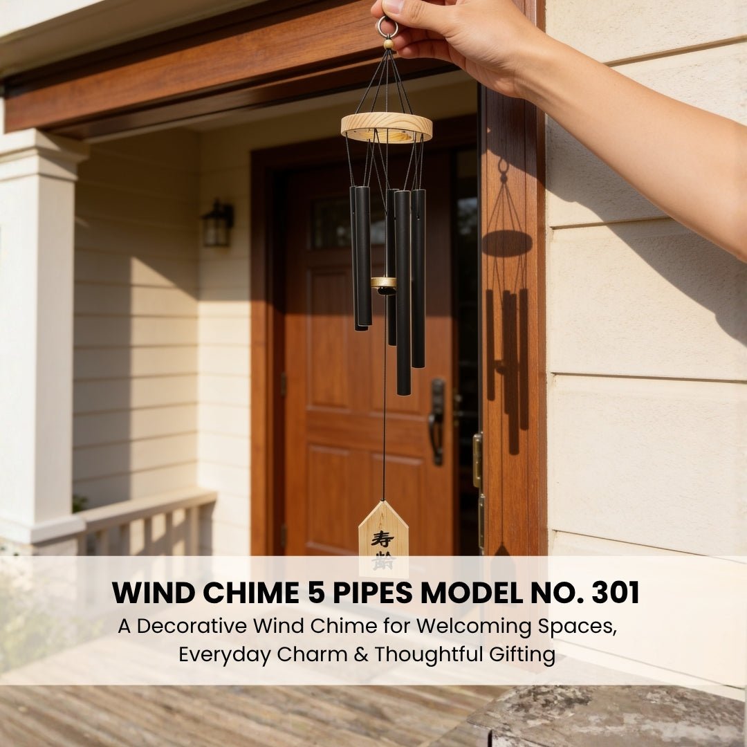 Model 301 5-pipe chime held suspended by hand demonstrating proportional tube lengths and balanced symmetry