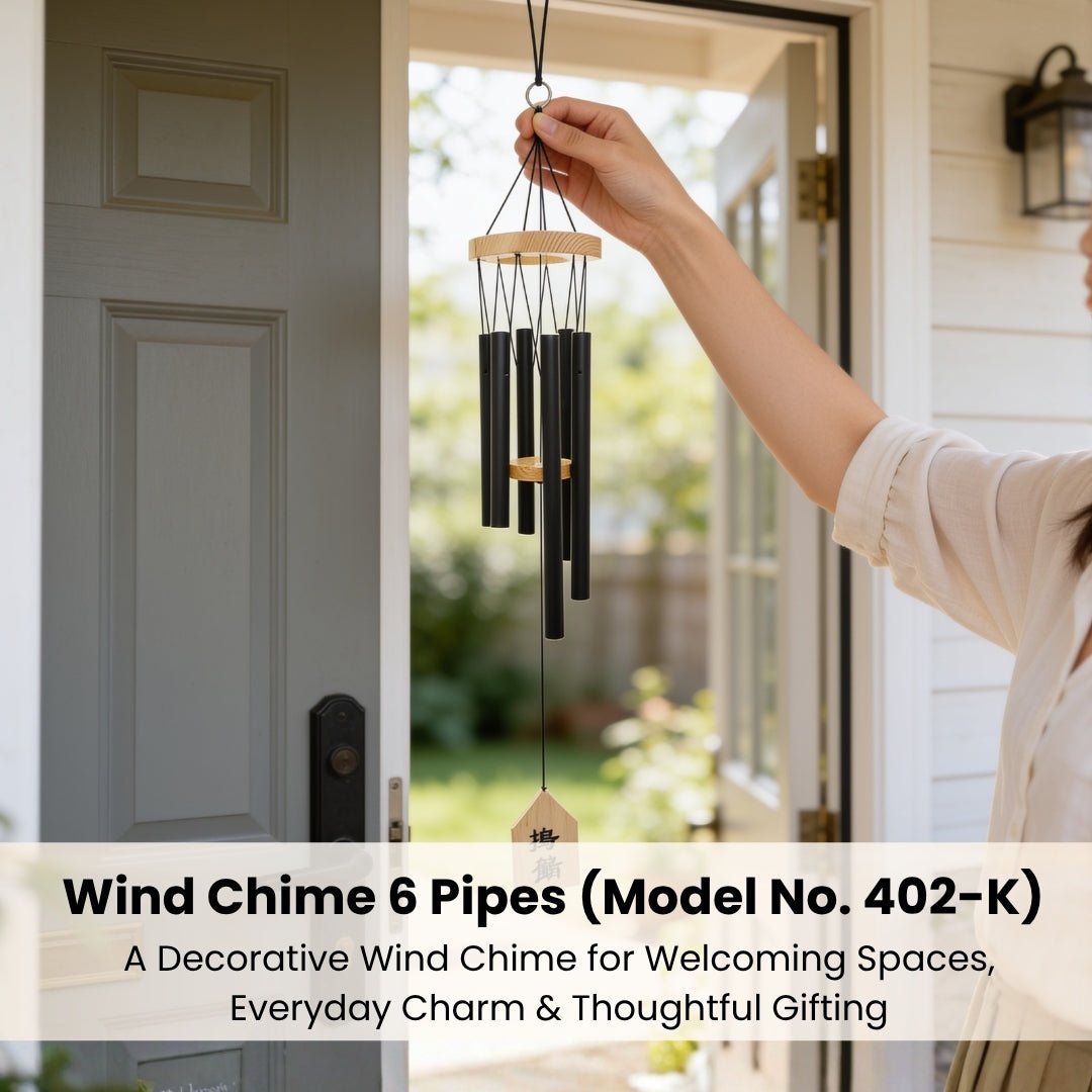 Model 402-K 6-pipe chime suspended by hand illustrating balanced 6-tube arrangement and lightweight build