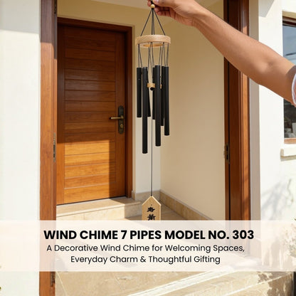 Model 303 7-pipe chime suspended by hand illustrating balanced circular spacing, lightweight build, and proportional pipe heights