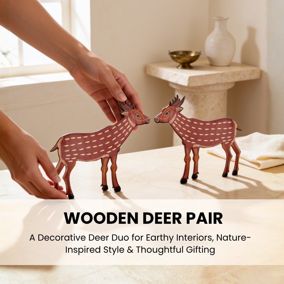 Carved wooden deer statue held in hand demonstrating lightweight handcrafted feel and proportion