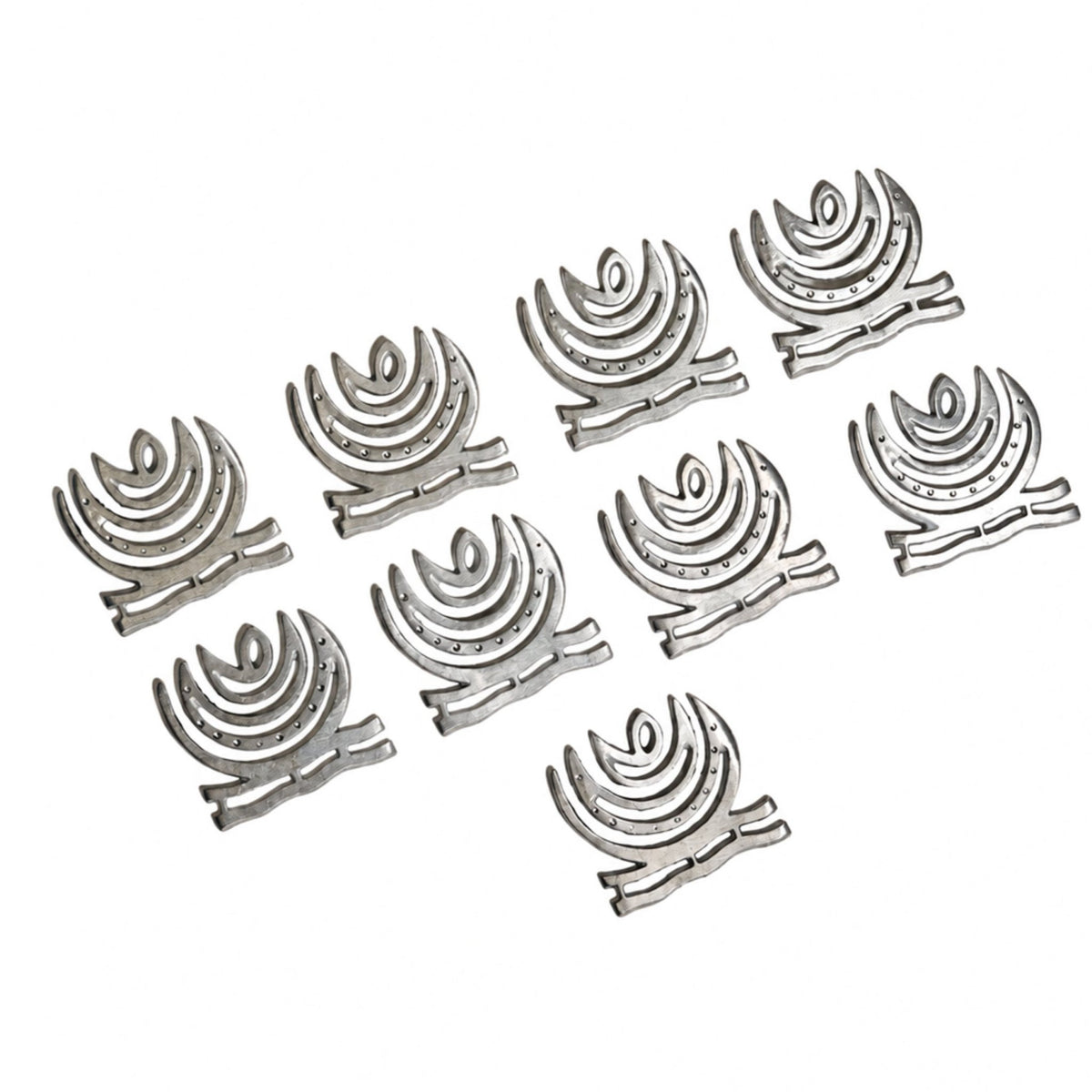 Lightweight 4-inch zinc Vastu helix resting in open hand demonstrating metallic shine, ergonomic profile, and smooth cast finish