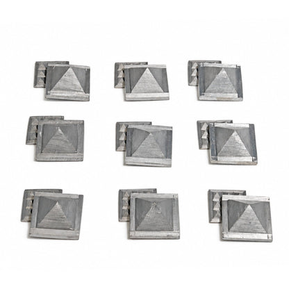Set of 9 solid Zinc 1 inch Vastu pyramids arranged in a 3x3 geometric grid for North-East Ishanya zone dosha rectification