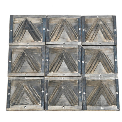 Set of 9 Zinc 2.5-inch Vastu pyramids securely fitted in custom foam slots inside a heavy-duty branded box with placement diagram