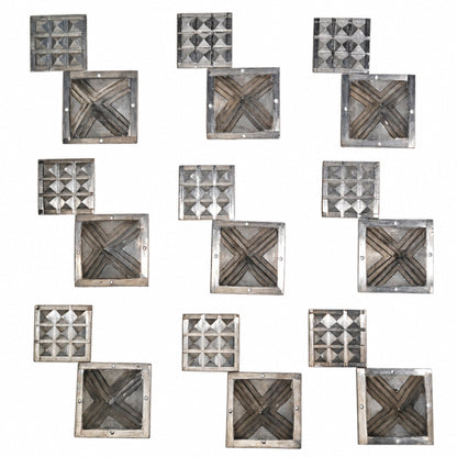 Solid 2.5-inch zinc pyramid held in open hand demonstrating heavy metallic density, solid craftsmanship, and substantial size